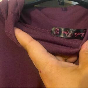 Plum colored sleeveless top